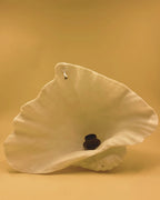 L'applique murale ZURI CLAM