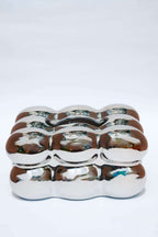 LA BOÎTE DE MOUCHOIRS À BULLES